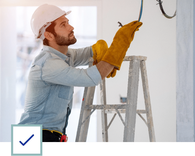 Electrician in a Ladder with a Wire